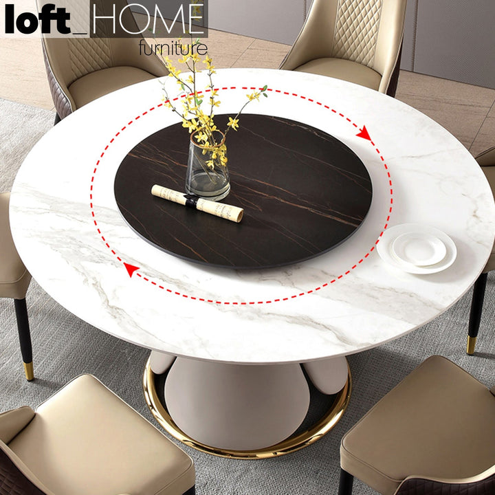 Modern sintered stone round dining table petal in panoramic view.