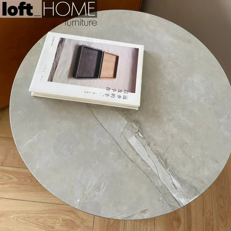 Modern sintered stone side table rosa in still life.