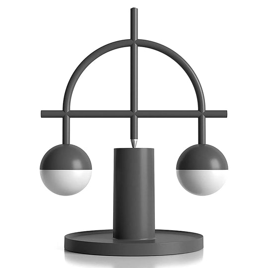 Bauhaus steel charging table lamp balance in white background.