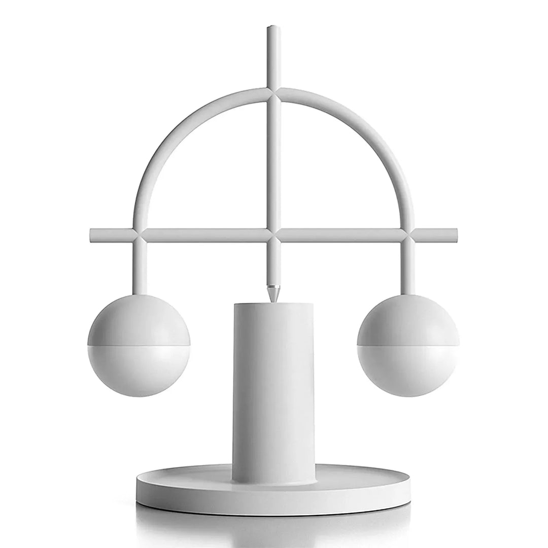 Contemporary steel charging table lamp balance with context.