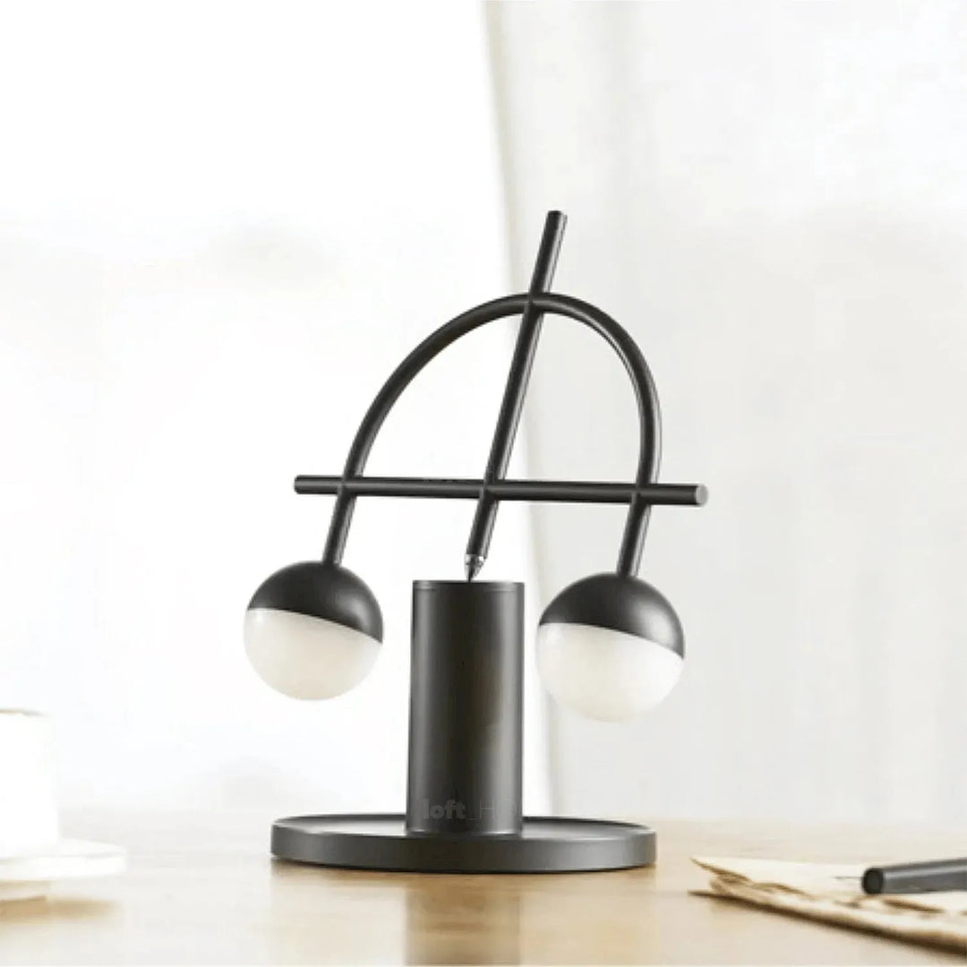 Modern steel charging table lamp balance in real life style.