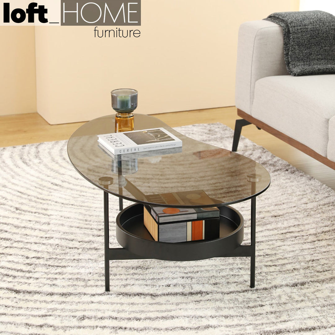 Modern tempered glass coffee table gioia in close up details.