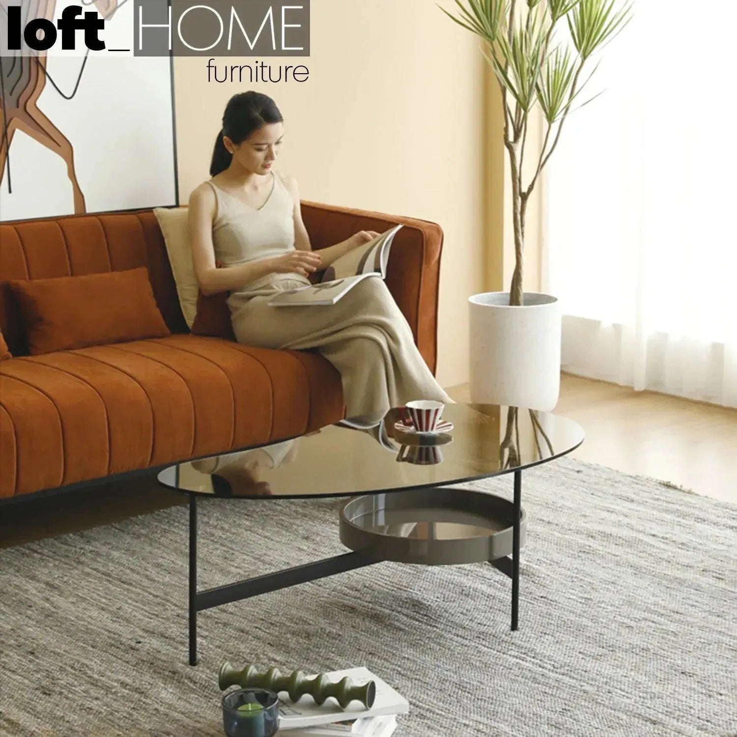 Modern tempered glass coffee table gioia in still life.