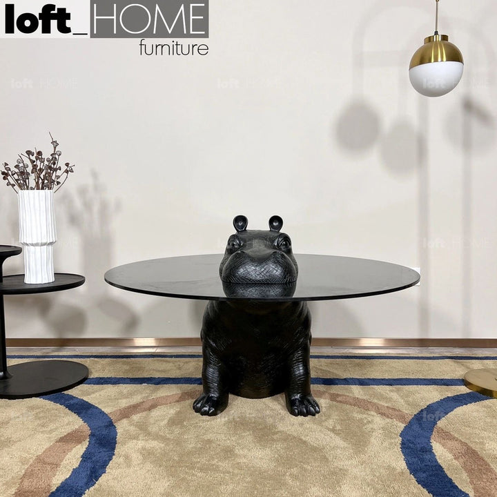 Modern tempered glass coffee table hippo in real life style.