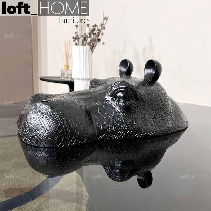 Modern tempered glass coffee table hippo in panoramic view.