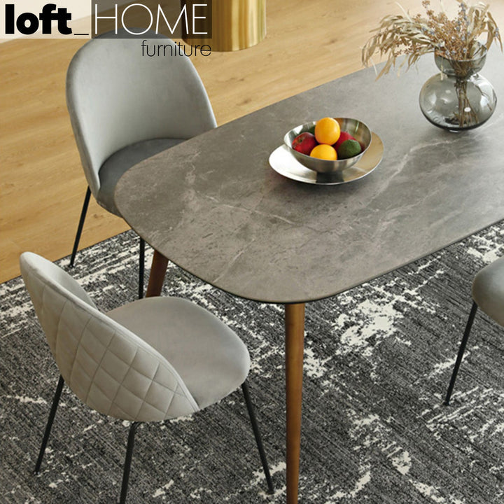 Modern tempered glass dining table gina with context.
