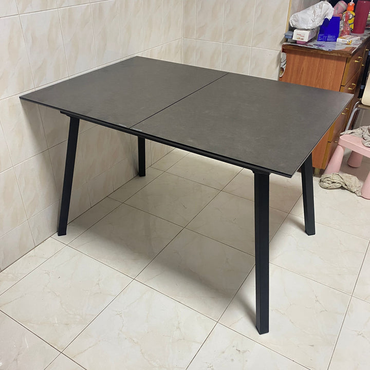 Modern tempered glass extendable dining table glaze material variants.
