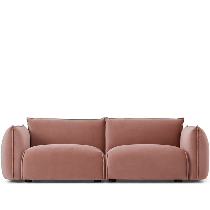 Modern velvet 3 seater sofa dion in white background.