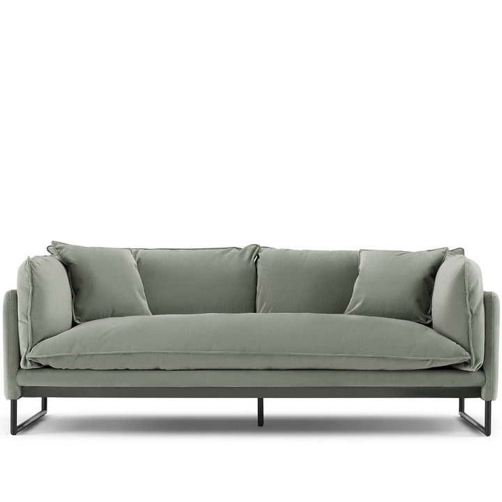Modern velvet 3 seater sofa malini in white background.