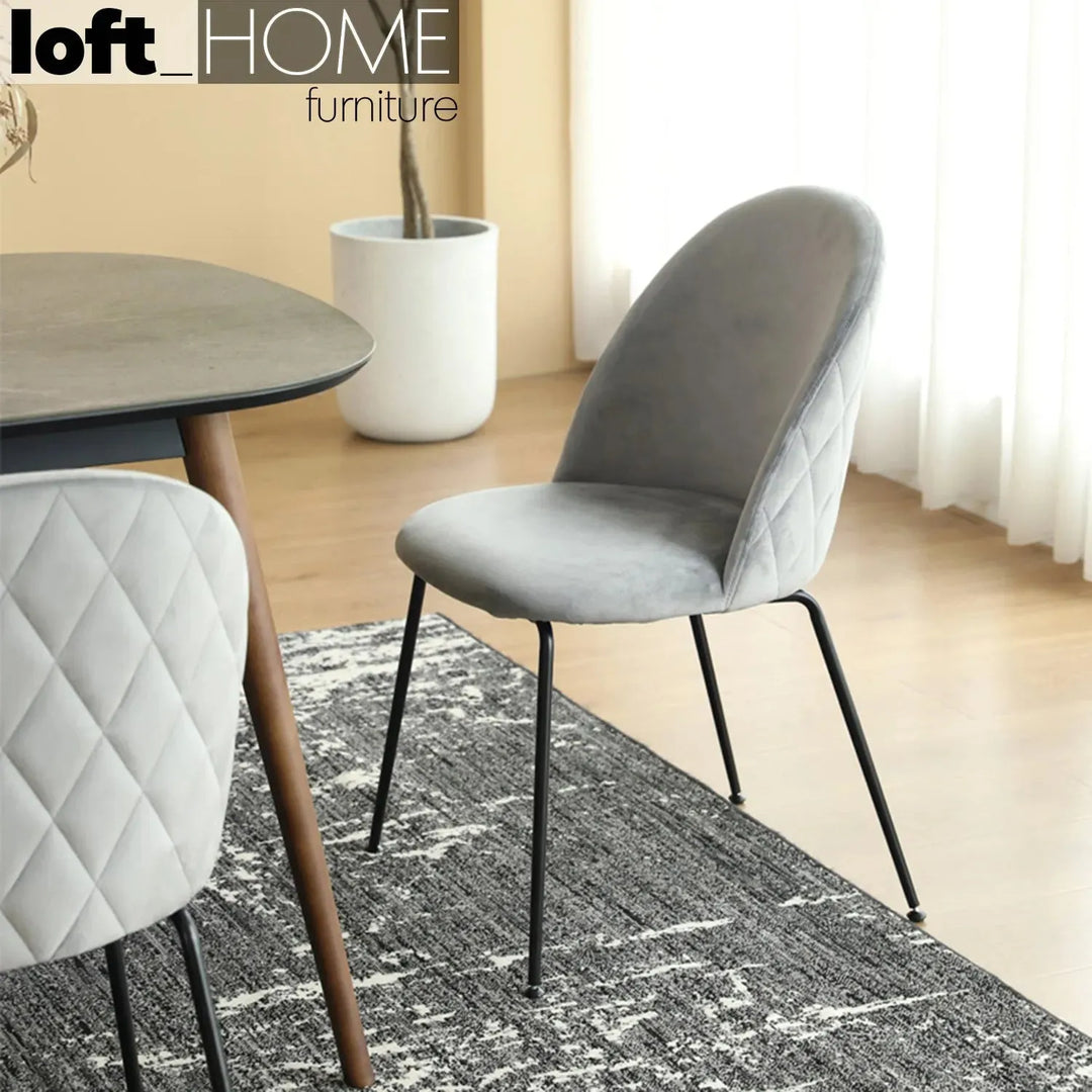 Modern velvet dining chair grey velvet primary product view.