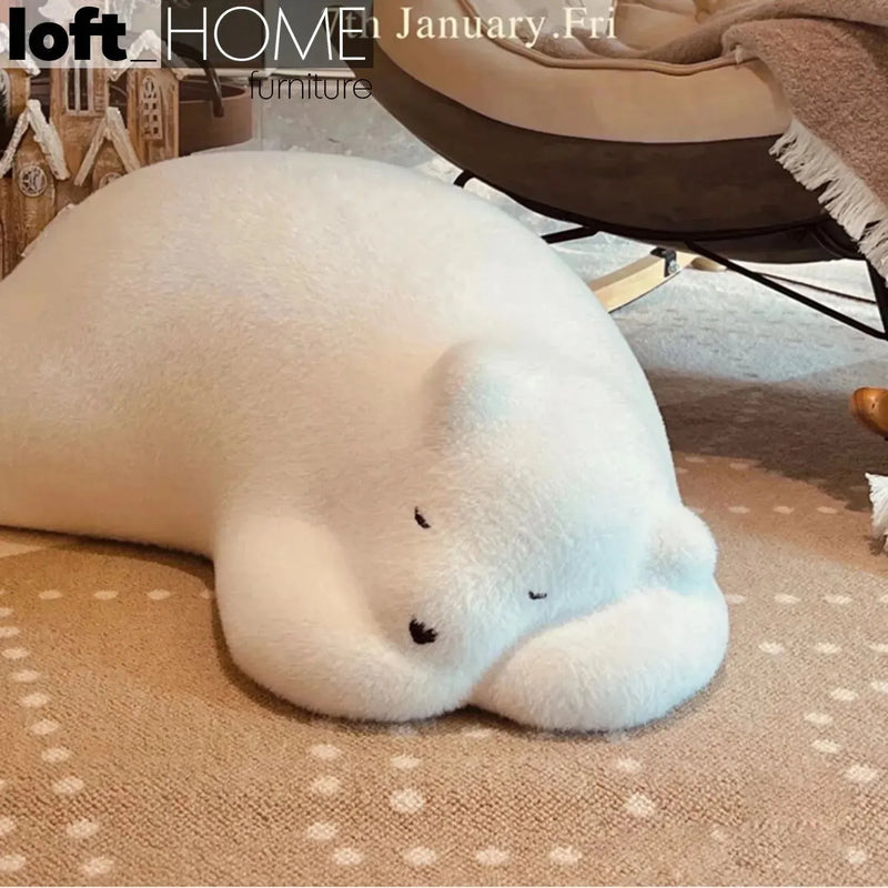 Bauhaus velvet ottoman resting bear white with context.