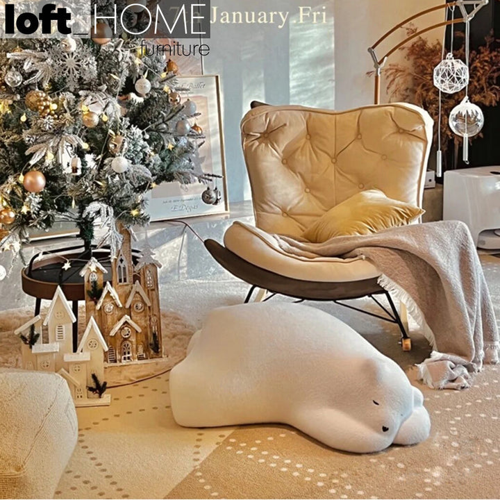 Modern velvet ottoman resting bear white in real life style.