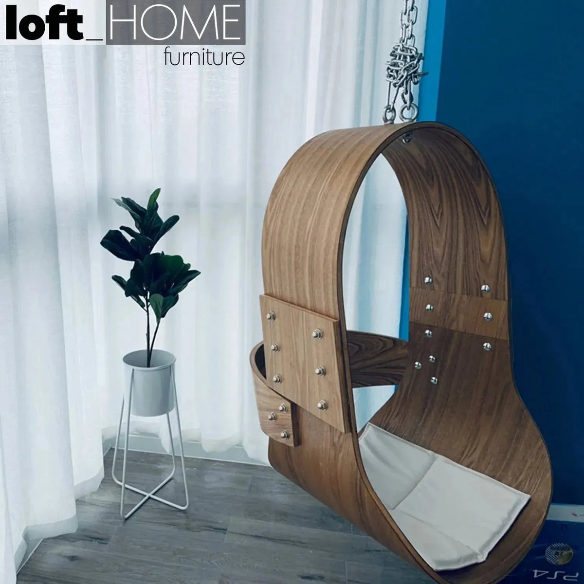 Scandinavian wood hanging chair 1 seater sofa plywood in panoramic view.