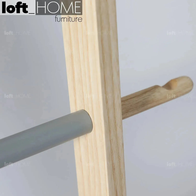 Modern wood tower ladder cloth hanger gonn in still life.