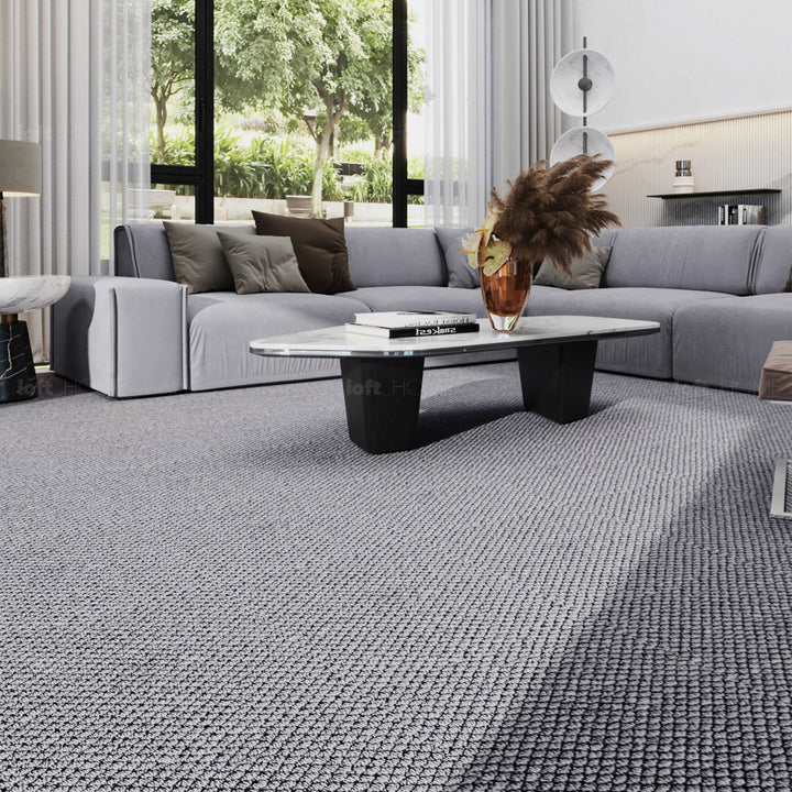 Modern wool area rug cole in panoramic view.