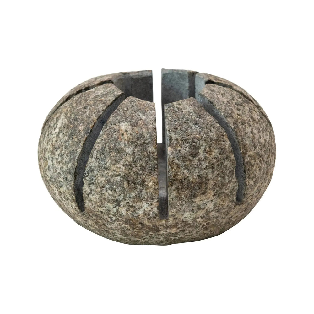 Natural stone tealight holder (each one will vary) decor in white background.