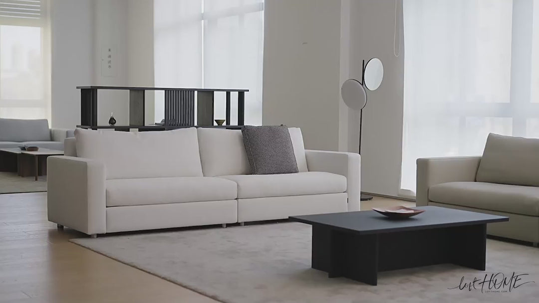 Minimalist fabric 3 seater sofa white with context.