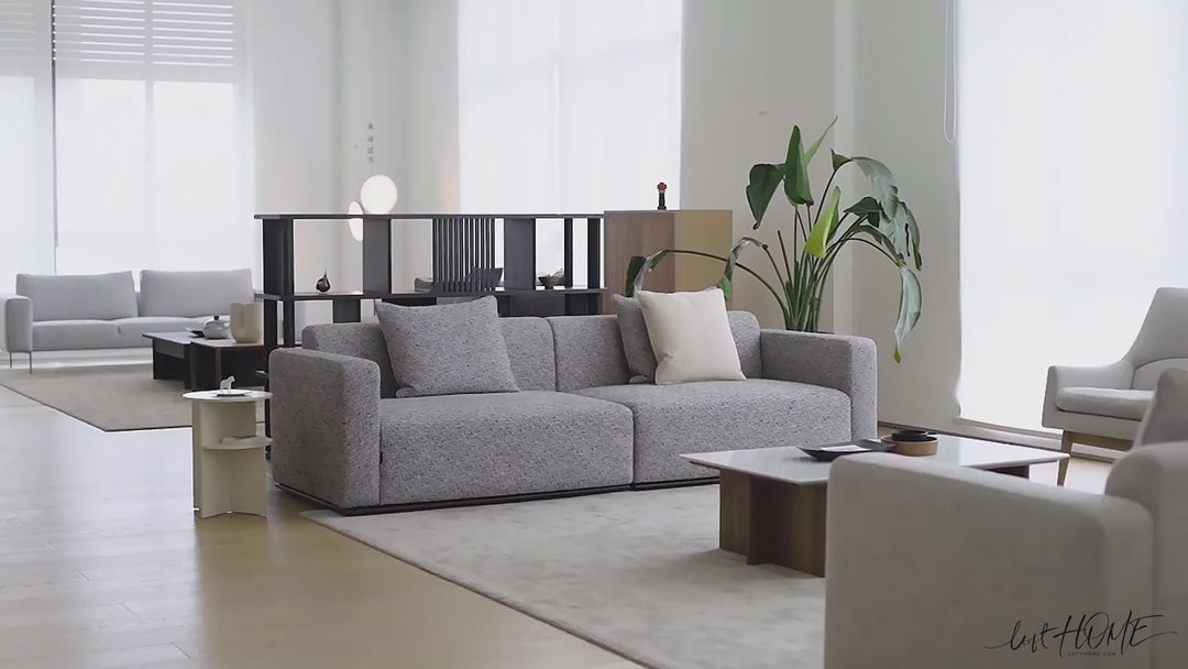 Minimalist fabric 4 seater sofa nemo with context.