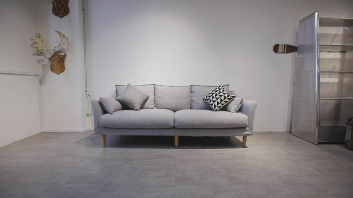 Modern fabric 3 seater sofa cammy with context.