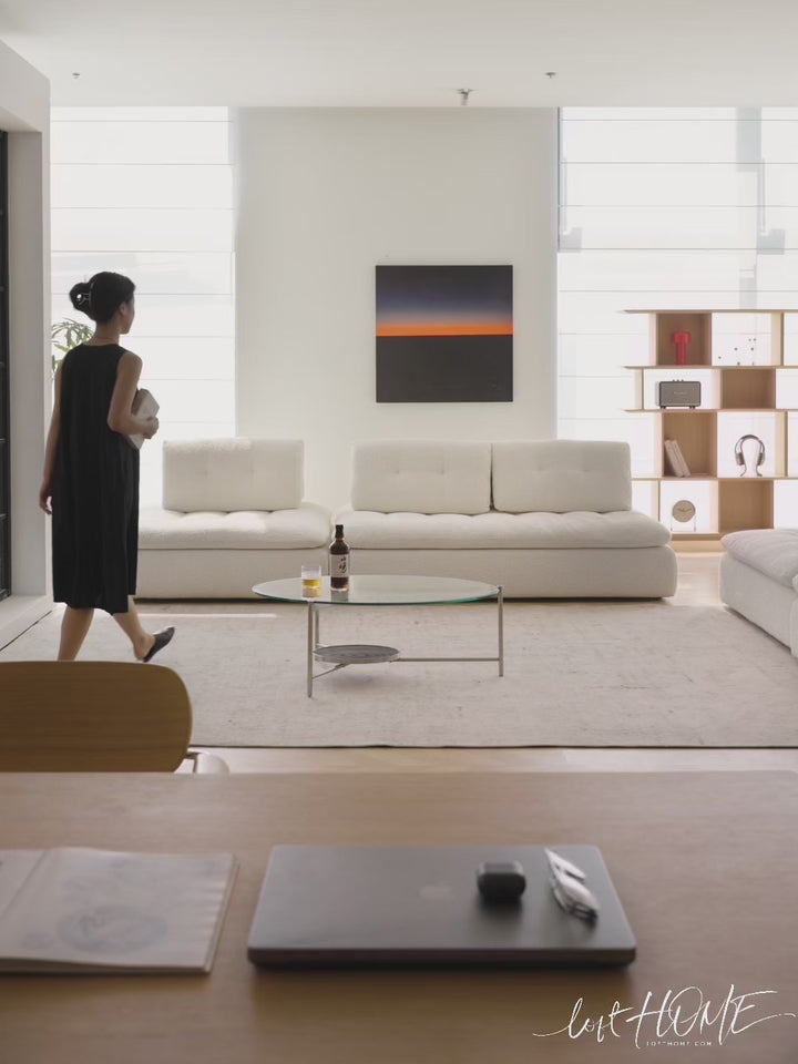 Cream boucle fabric modular 2 seater sofa couch bloc in still life.