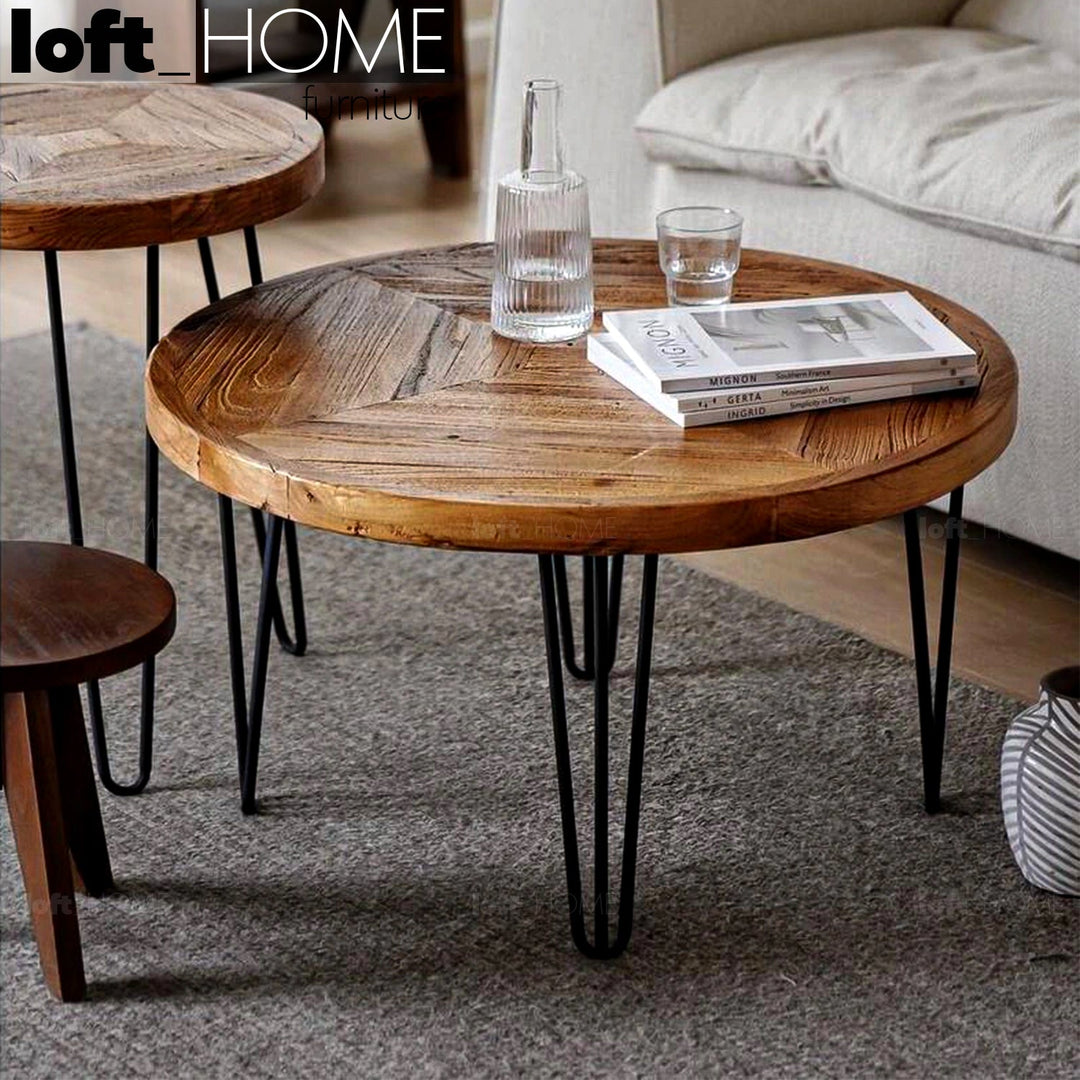 Rustic elm wood round coffee table aura elm primary product view.