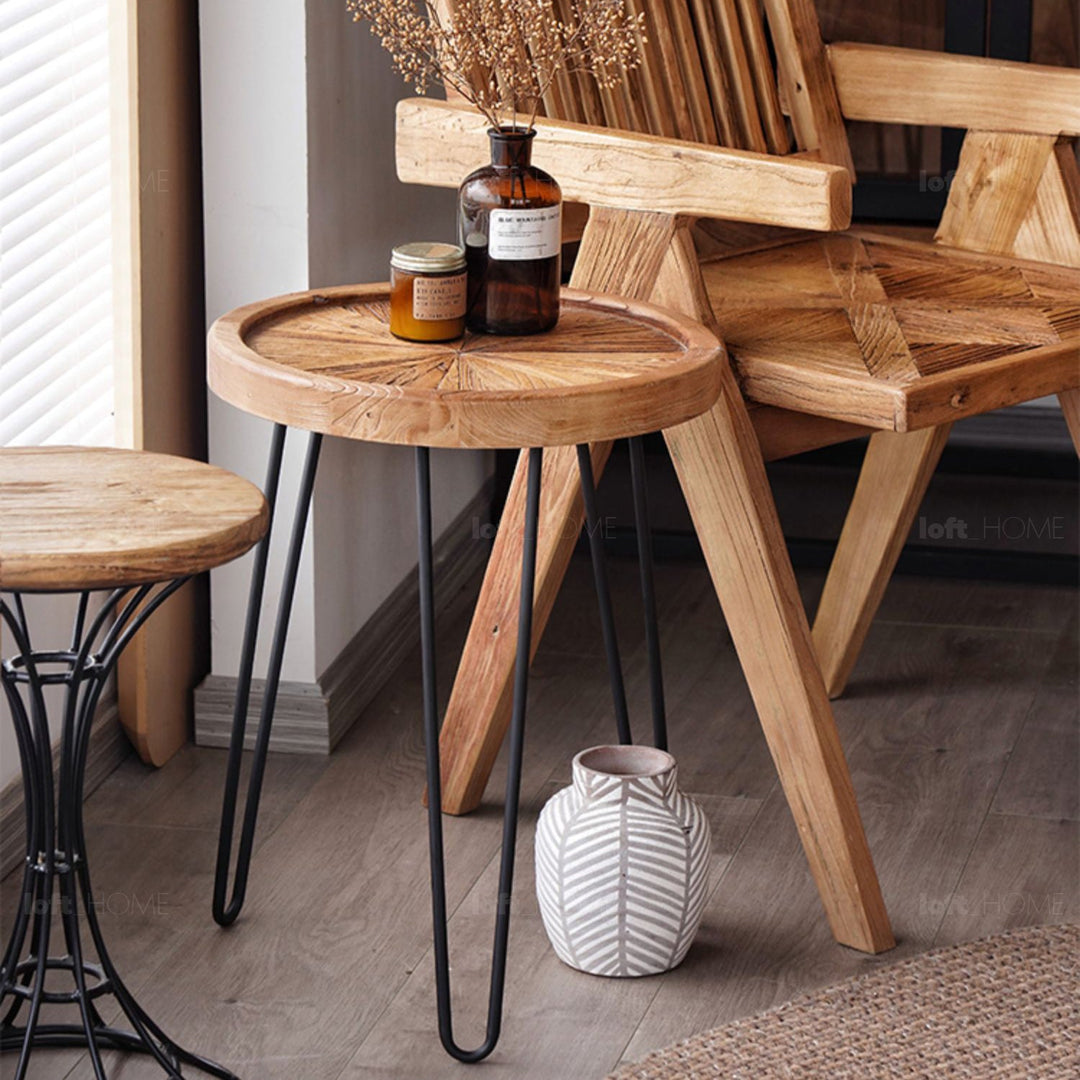 Rustic elm wood round side table eclat elm in panoramic view.
