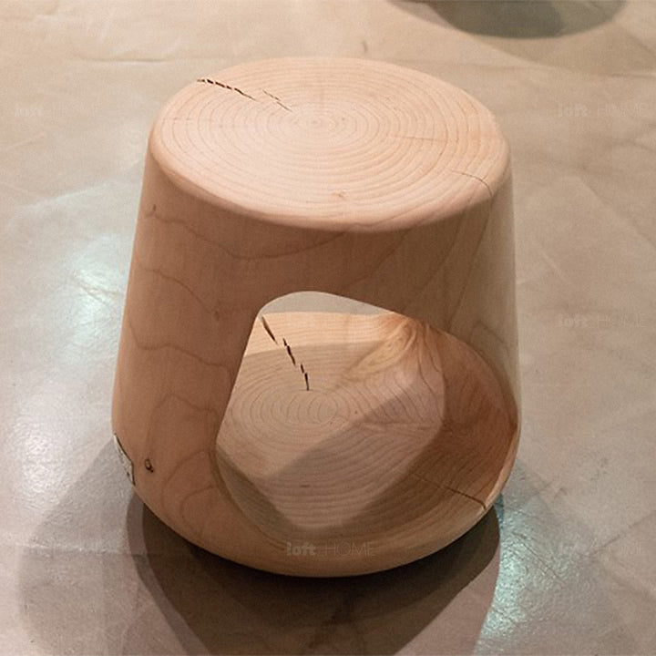 Rustic wood side table geppo in close up details.