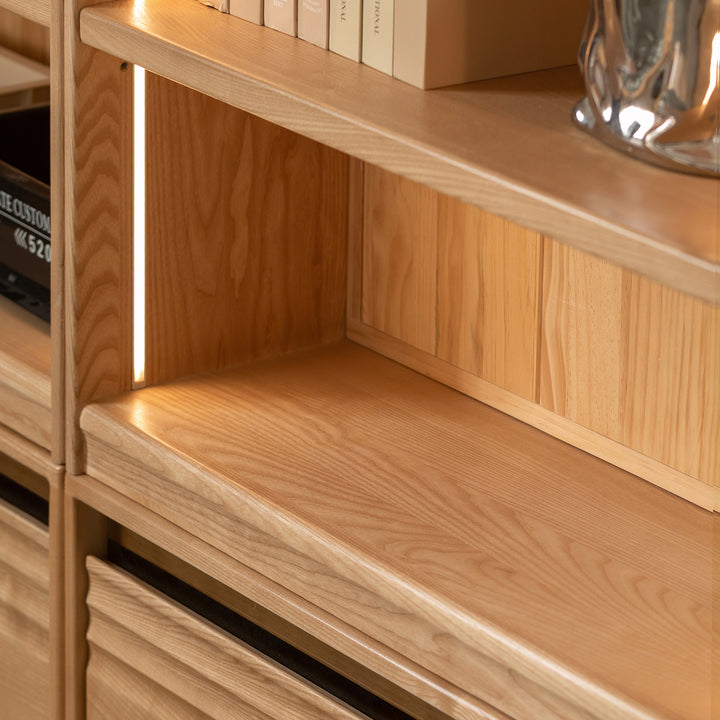 Scandinavian ash wood bookshelf gallery in panoramic view.