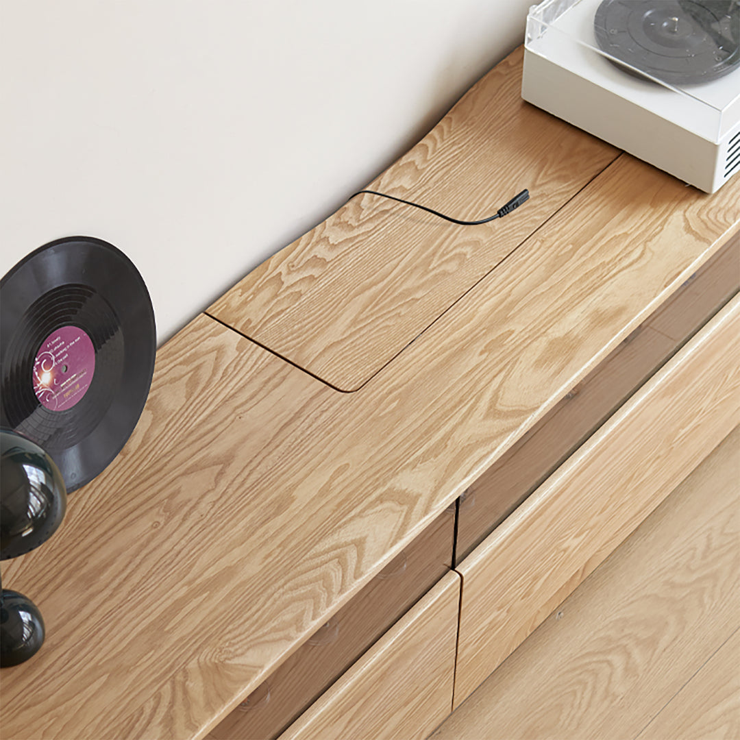 Scandinavian ash wood tv console curate in still life.