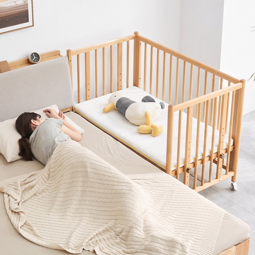 Scandinavian beech wood bed side baby crib with wheels ember size charts.