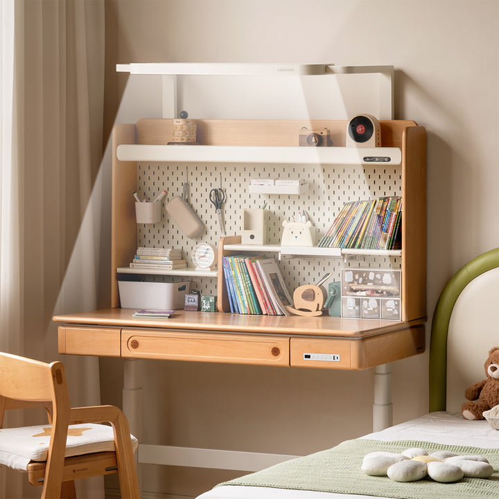 Scandinavian beech wood electric height adjustable kids study table with intergrated led light orbita material variants.