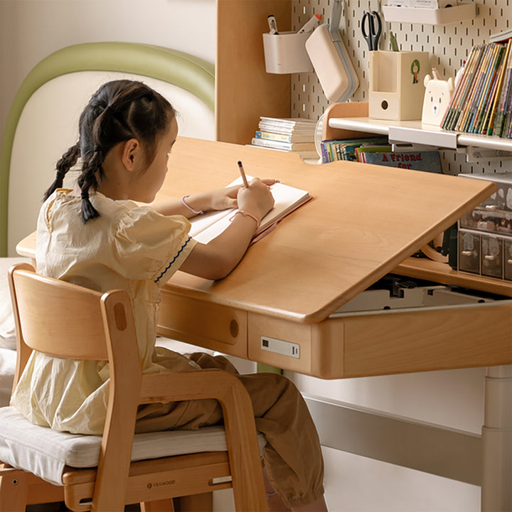 Scandinavian beech wood electric height adjustable kids study table with intergrated led light orbita in details.