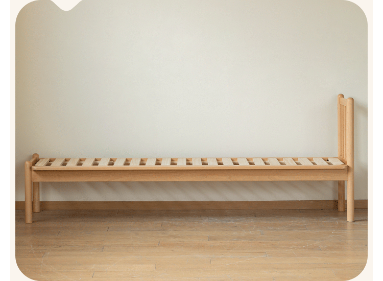 Scandinavian beech wood height adjustable kids sidecar bed with mattress anchor in real life style.