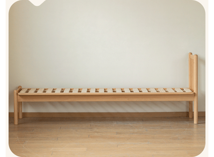 Scandinavian beech wood height adjustable kids sidecar bed with mattress anchor in real life style.