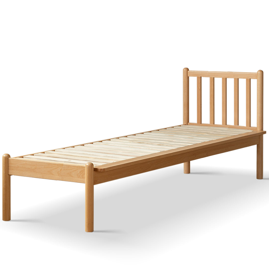 Scandinavian beech wood height adjustable kids sidecar bed with mattress anchor in white background.