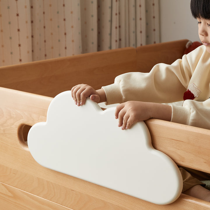 Scandinavian beech wood kids storage bed with slide and study desk cloud in still life.