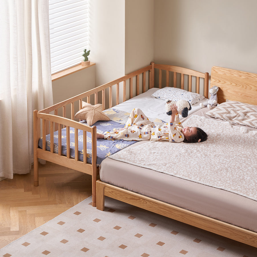 Scandinavian birch wood kids sidecar bed with mattress set myka primary product view.