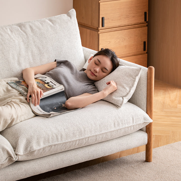 Scandinavian chenille velvet cherry wood 3 seater sofa sea salt in close up details.