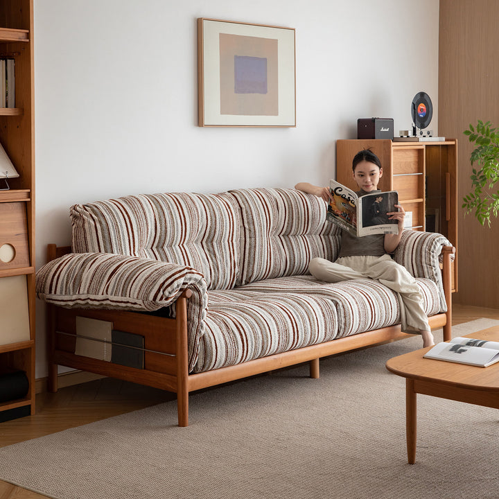 Scandinavian chenille velvet fabric cherry wood 3 seater sofa open backed with context.