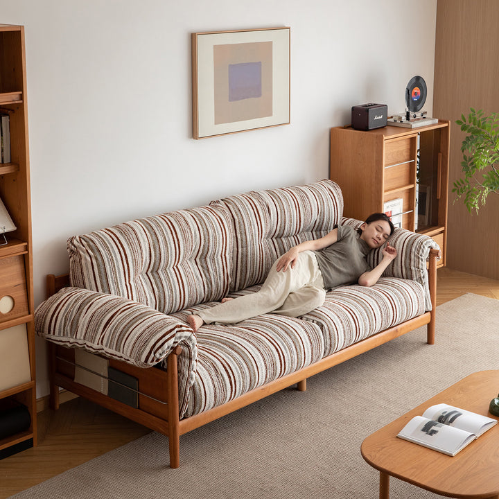 Scandinavian chenille velvet fabric cherry wood 3 seater sofa open backed in details.