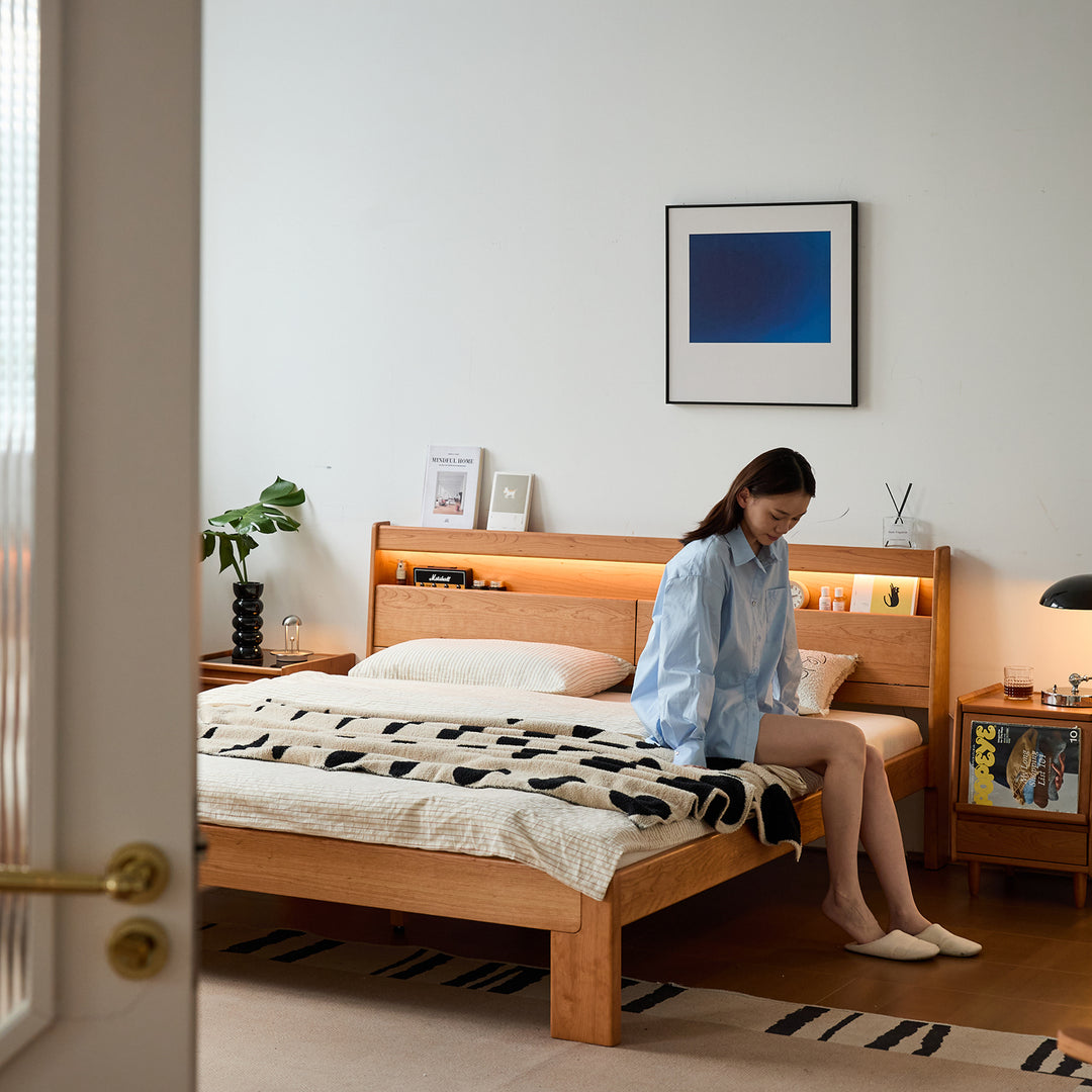 Scandinavian cherry wood bed accompany light material variants.