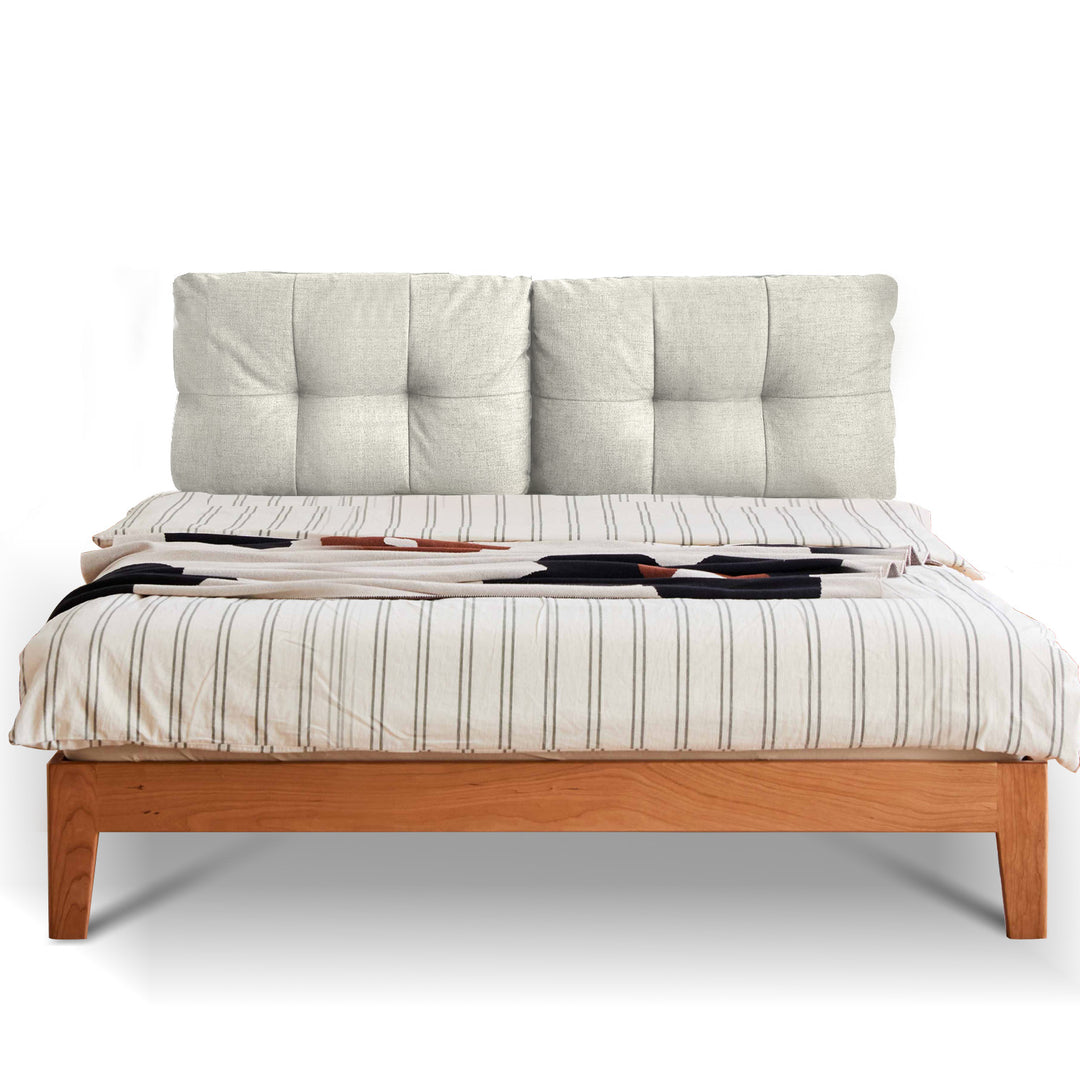 Scandinavian cherry wood cotton fabric bed serene in panoramic view.