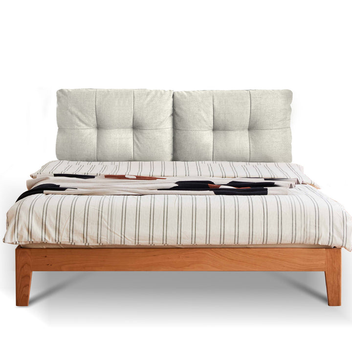 Scandinavian cherry wood cotton fabric bed serene in panoramic view.