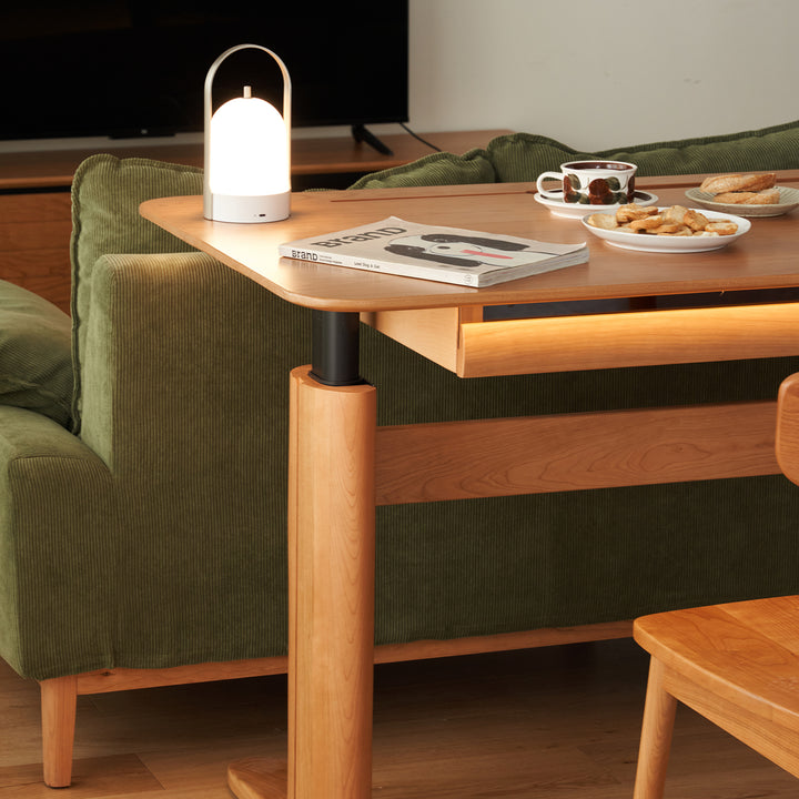 Scandinavian cherry wood electric height adjustable study table up in details.