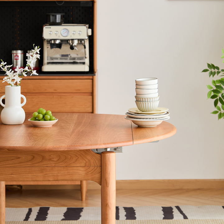 Scandinavian cherry wood extendable dining table minima in real life style.
