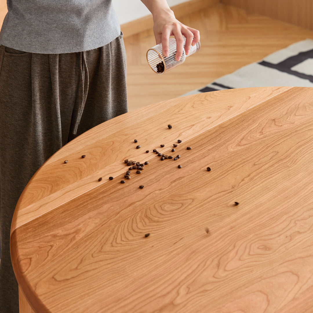 Scandinavian cherry wood extendable dining table minima in details.