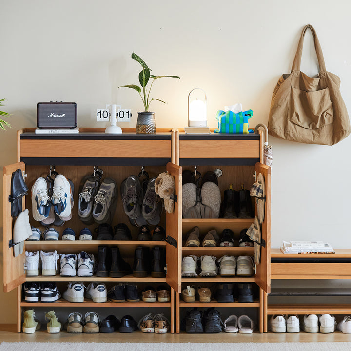 Scandinavian cherry wood modular shoe cabinet harbor in still life.