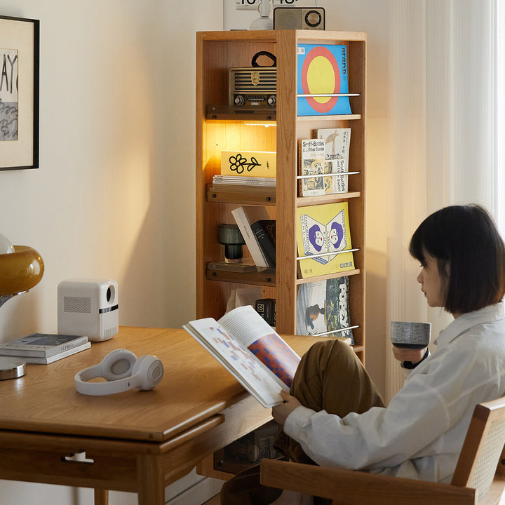 Scandinavian cherry wood revolving bookshelf with mirror twirl layered structure.