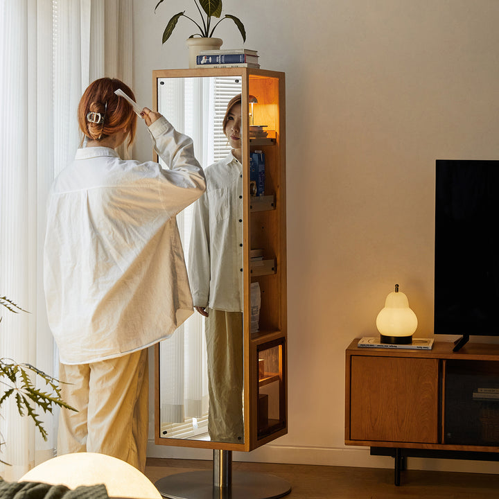 Scandinavian cherry wood revolving bookshelf with mirror twirl material variants.