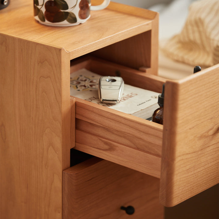 Scandinavian cherry wood side table cabo in still life.